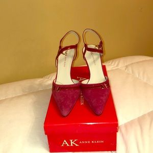 Crimson red suede pumps